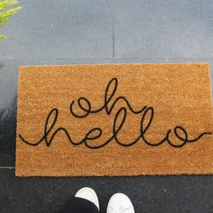 Covor intrare OH HELLO, 40x70 cm, forma dreptunghiulara, fibre de cocos, maro/negru