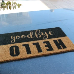 Covor intrare HELLO GOODYE, 70x40 cm, forma dreptunghiulara, fibra de cocos, maro/negru